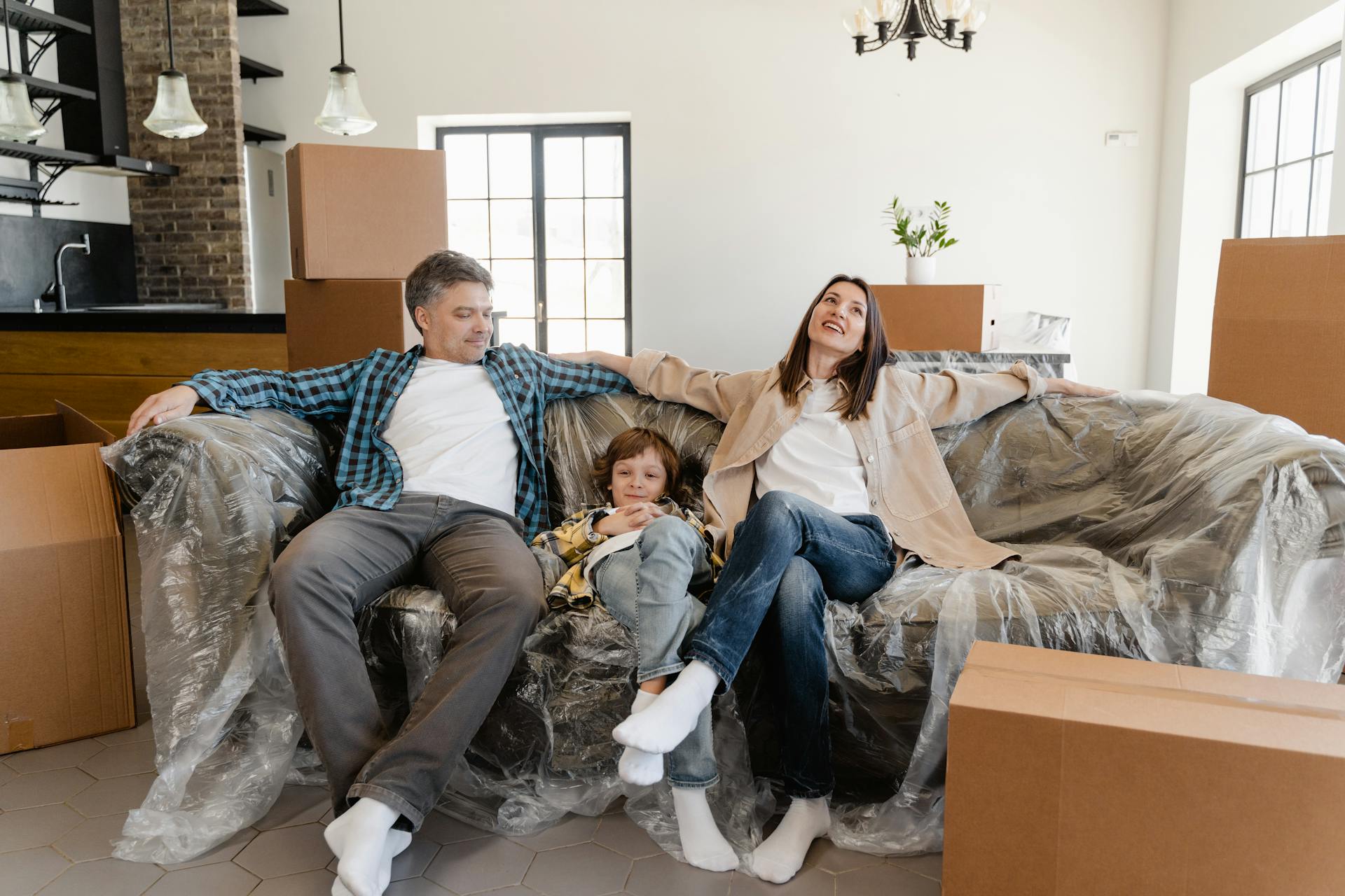 Family at the door of their new home
